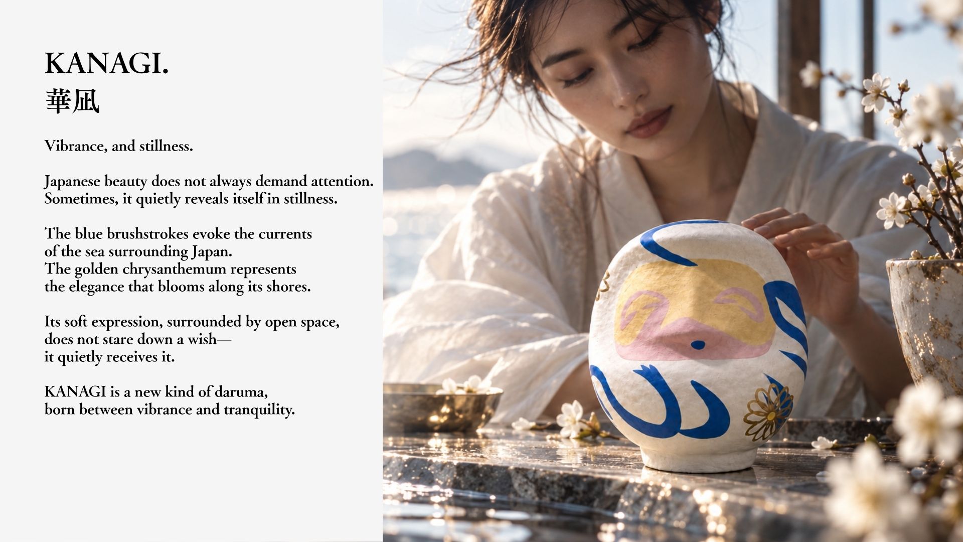 A woman by the water beside a blue-and-gold daruma — the world of KANAGI